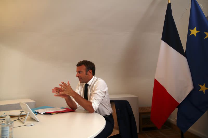 French President Emmanuel Macron speaks during a Defense Council video conference on Niger at the Fort de Bregancon