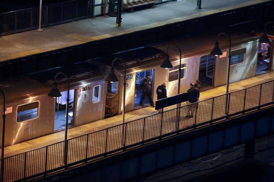 A 15-year-old boy turned himself into police for a Bronx subway shooting in February that killed one person and left five others injured. AP Photo/Cedar Attanasio