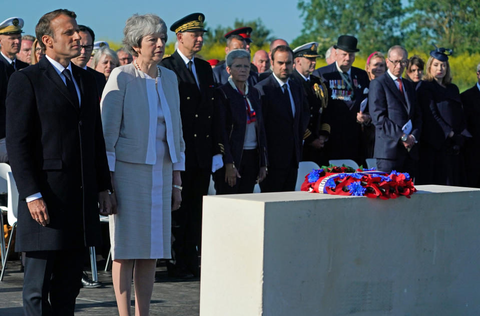 Prime Minister Theresa May and French President Emmanuel Macron at the Inauguration of the British Normandy Memorial site in Ver-sur-Mer, France, during commemorations for the 75th anniversary of the D-Day landings. PRESS ASSOCIATION Photo. Picture date: Thursday June 6, 2019. See PA story MEMORIAL DDay. Photo credit should read: Owen Humphreys/PA Wire