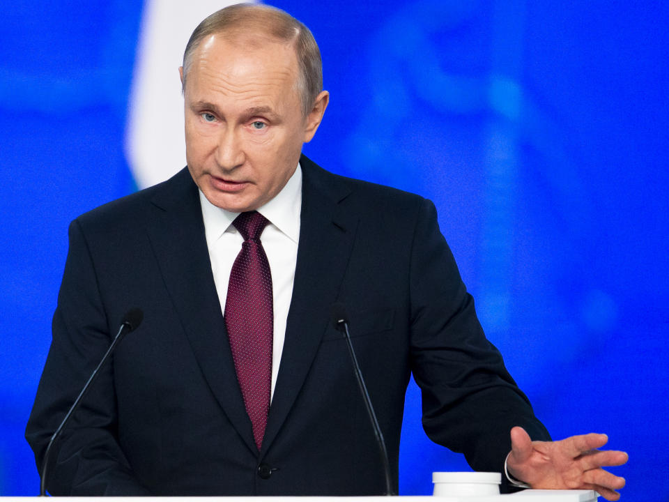 Russian President Vladimir Putin delivers a state-of-the-nation address in Moscow, Russia, Wednesday, Feb. 20, 2019. Putin sternly warned the United States against deploying new missiles in Europe, saying that Russia will retaliate by fielding new weapons that will take just as little time to reach their targets. (AP Photo/Alexander Zemlianichenko)