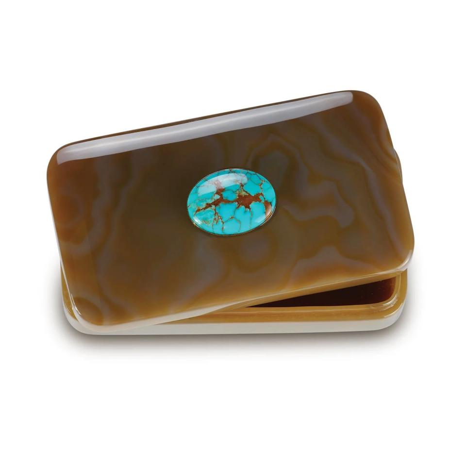 <p><a href="https://seamanschepps.com/products/large-box-agate-turquoise?_pos=1&_sid=0ff18b632&_ss=r&variant=42675457556655" rel="nofollow noopener" target="_blank" data-ylk="slk:Shop Now;elm:context_link;itc:0;sec:content-canvas" class="link ">Shop Now</a></p><p>Hand-Carved Stone Box in Banded Agate</p><p>seamanschepps.com</p><p>$7000.00</p>