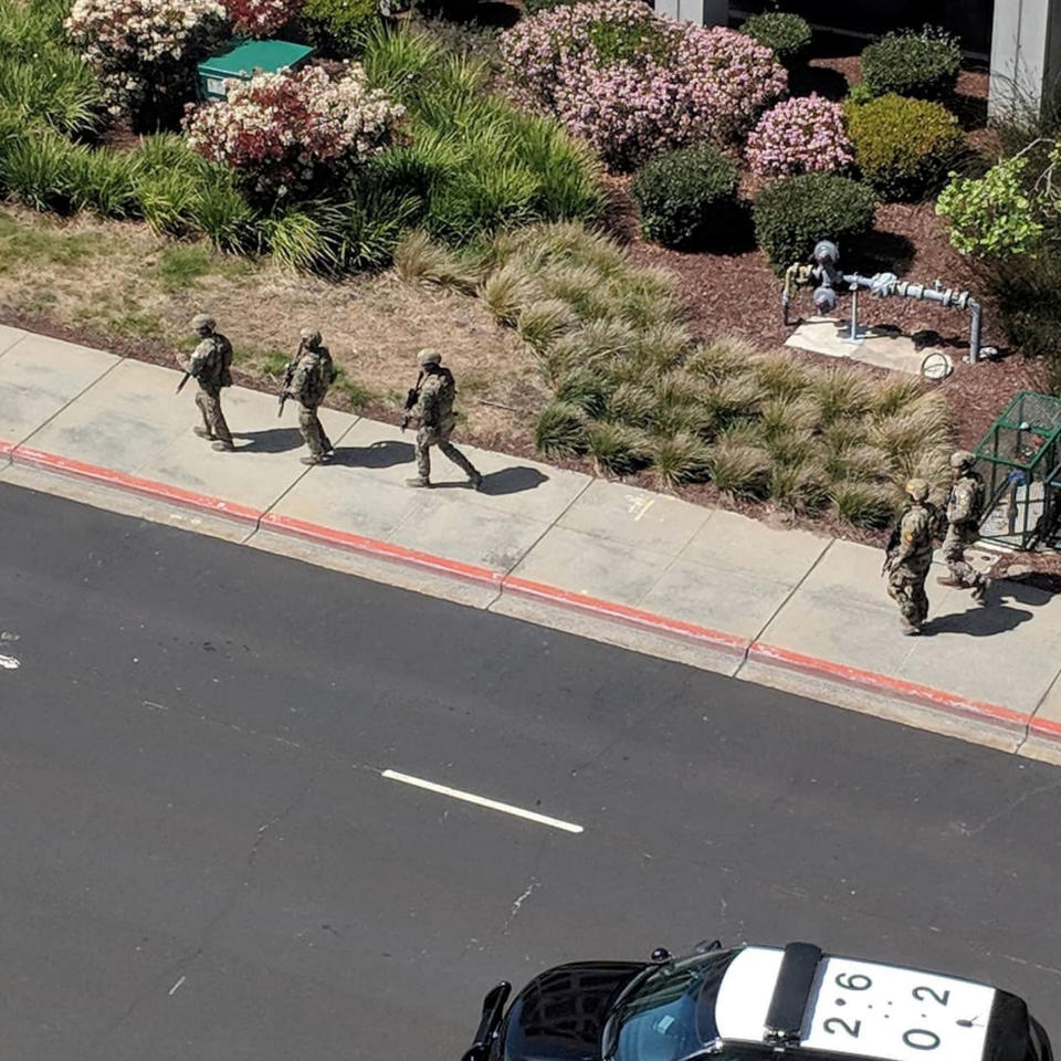 <p>Law enforcement officials react following a shooting at the headquarters of YouTube in San Bruno, Calif. on April 3, 2018. (Photo: Graeme Macdonald/Via Reuters) </p>