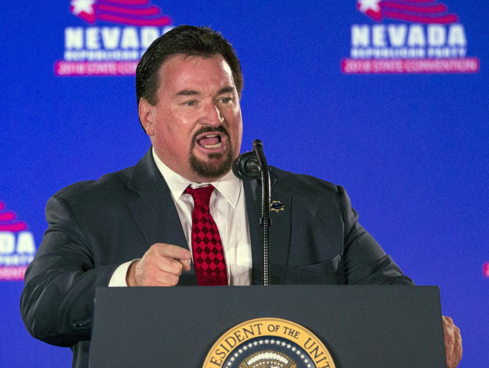 FILE - In this June 23, 2018 file photo Nevada State GOP Chairman Michael McDonald speaks at the Nevada Republican Party Convention in Las Vegas. Republicans in Nevada are calling for an investigation into a vote last month to censure the GOP secretary of state after allegations emerged that the balloting was swayed by activists with ties to the far-right Proud Boys extremist group. The Nevada Republican Party disputed the allegations and the statements made by their fellow party members as "slanderous lies." McDonald told the newspaper that he was not involved in the censure and did not recruit anyone to participate in the vote. (AP Photo/L.E. Baskow,File)