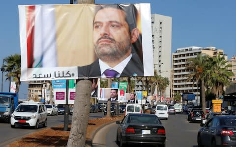 Posters in solidarity with Mr Hariri have gone up in parts of Lebanon - Credit: REUTERS/Mohamed Azakir