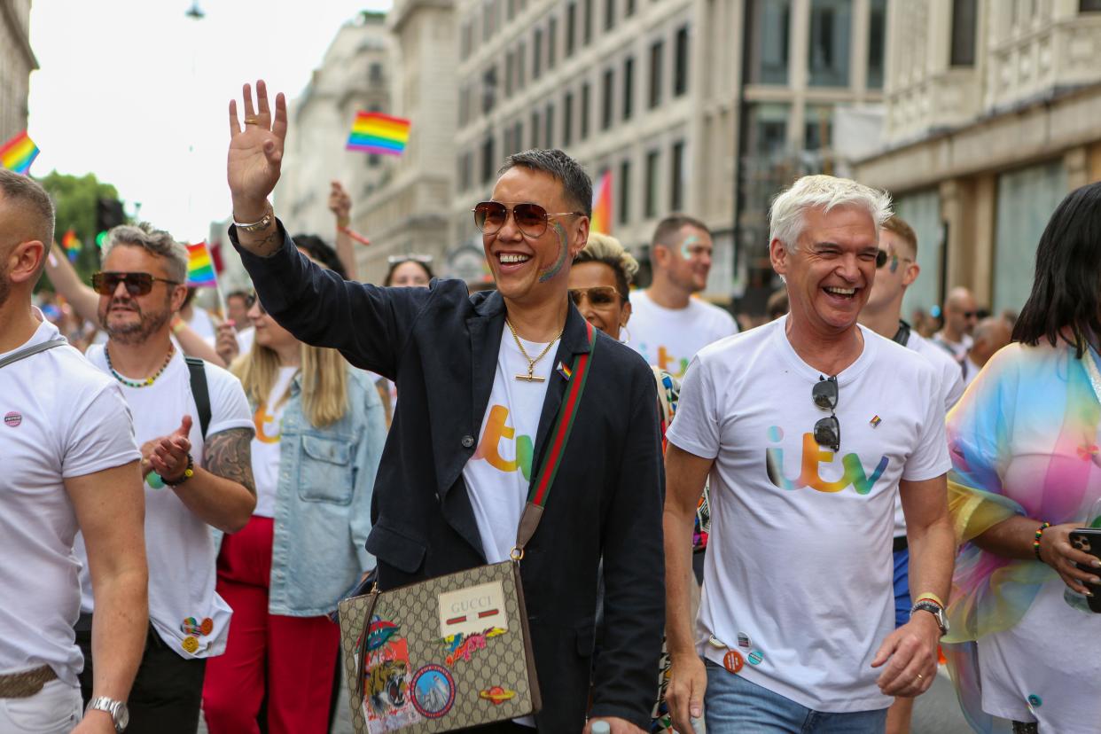 Gok Wan (L) and Phillip Schofield attend the Pride Parade. Thousands of people have gathered across London to take part in this year's Pride celebrations - which marks 50 years since the first march for LGBTQ+ rights in the capital. (Photo by Pietro Recchia / SOPA Images/Sipa USA)