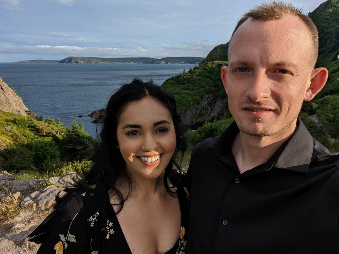 Kathleen Abreo and Dr. Travis Barron. Abreo says a move to N.L. would be on the table if she could work as a physician assistant.  (Submitted by Kathleen Abreo  - image credit)