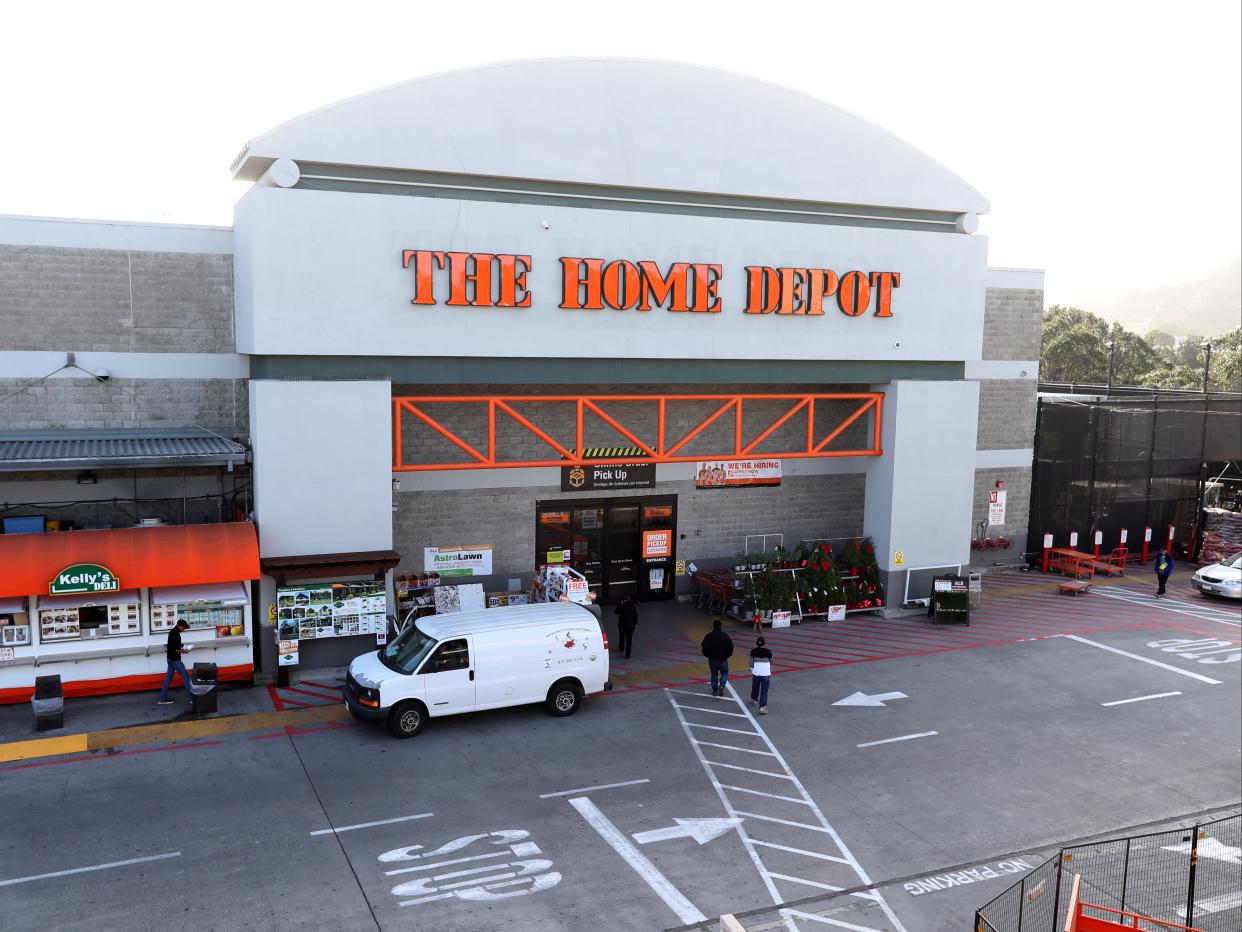 <p>Customers enter a Home Depot store on November 19, 2019 in Colma, California</p> (Getty)