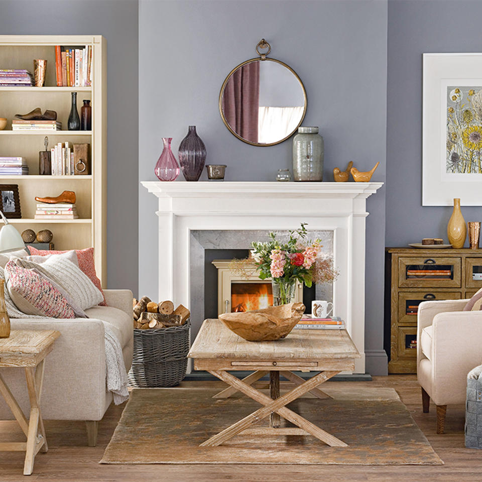 Living room with fireplace, sofa and coffee table