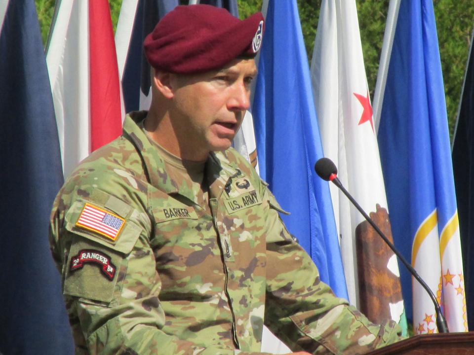 Command Sgt. Maj. Bryan Barker, the incoming senior enlisted leader for the 18th Airborne Corps, makes remarks during a change of responsibility ceremony Friday, Aug. 11, 2023, on Fort Liberty.