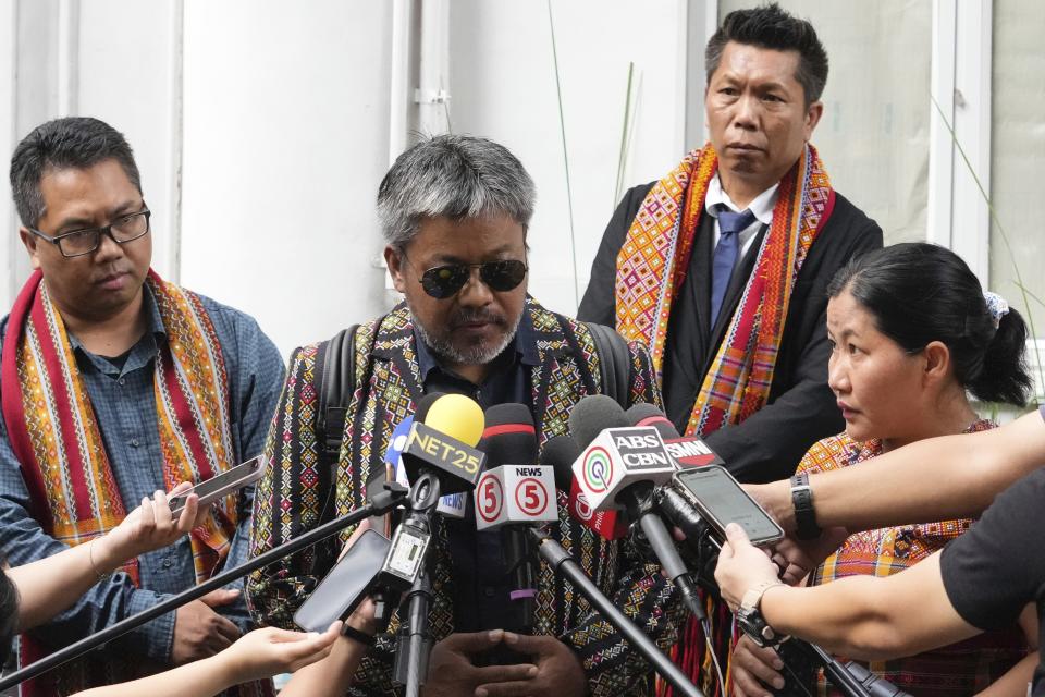 Burmese Salai Za Uk Ling talks to reporters before filing a criminal complaint against Myanmar's top generals at the Department of Justice in Manila, Philippines on Wednesday Oct. 25, 2023. Relatives of victims of alleged war crimes committed by Myanmar’s military filed a criminal complaint in the Philippines against their nation’s ruling generals in a desperate attempt to test whether such a case could succeed outside the violence-wracked country.(AP Photo/Aaron Favila)
