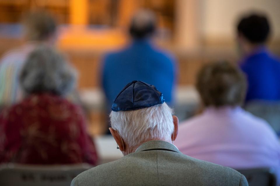 An attendee wears a yarmulke during the annual Interfaith Thanksgiving Service inside the St. Paul's Episcopal Church in Salinas, Calif., on Sunday Nov. 21, 2021. 