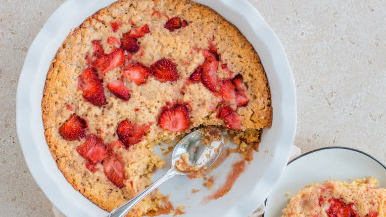 strawberry spoon cake in round dish