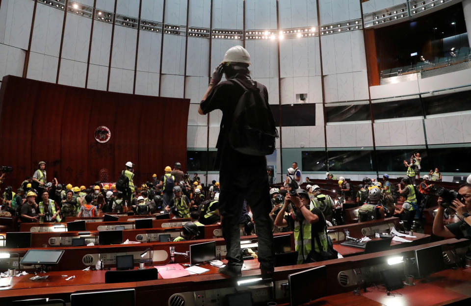 Protesters are seen inside a chamber after they broke into the Legislative Council building during the anniversary of Hong Kong's handover to China in Hong Kong, China July 1, 2019. (Photo: Tyrone Siu/Reuters)