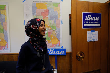 U.S. Democratic congressional candidate Ilhan Omar smiles in a campaign office in Minneapolis, Minnesota, U.S., October 26, 2018. Picture taken October 26, 2018. REUTERS/Brian Snyder