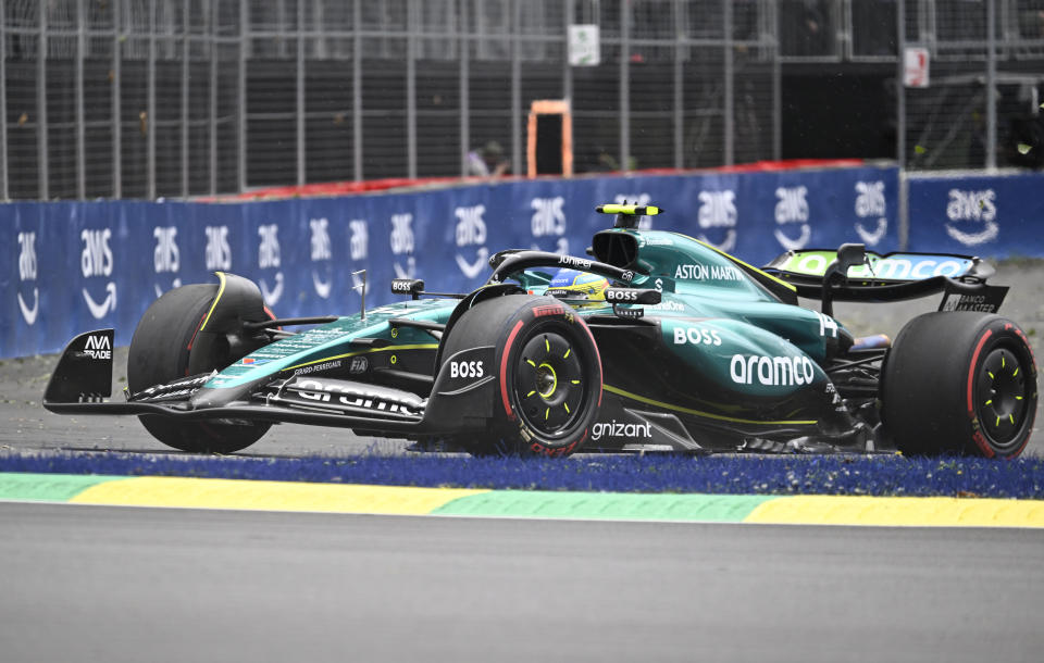 Aston Martin driver Fernando Alonso of Spain cuts through the Senna corner during the second practice session at the F1 Canadian Grand Prix auto race in Montreal, Friday, June 7, 2024. (Jacques Boissinot/The Canadian Press via AP)