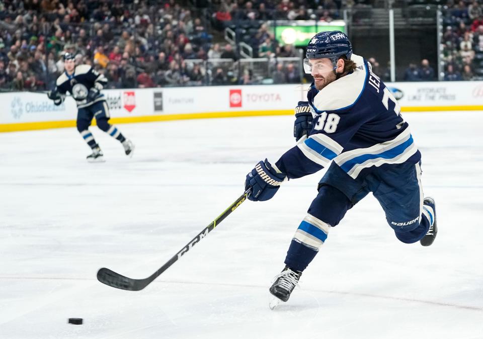 Columbus Blue Jackets center Boone Jenner (38) fires a shot during the first period of the NHL hockey game against the Minnesota Wild at Nationwide Arena in Columbus on March 11, 2022.