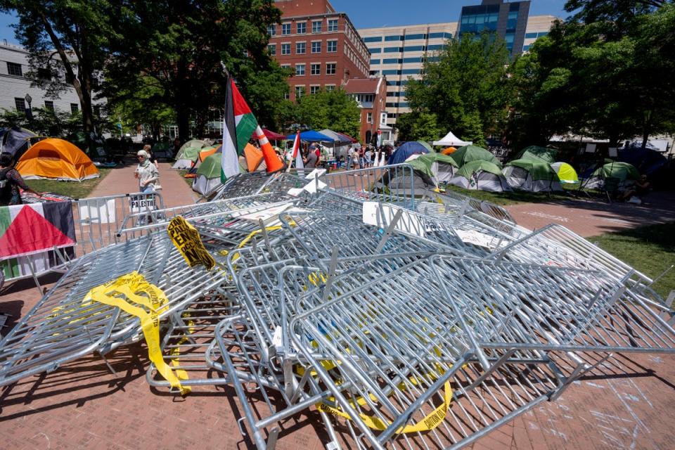 Barricades torn down by demonstrators piled in the centre of an encampment by students protesting against the Israel-Hamas war at George Washington University on 29 April (Copyright 2024 Associated Press. All rights reserved)