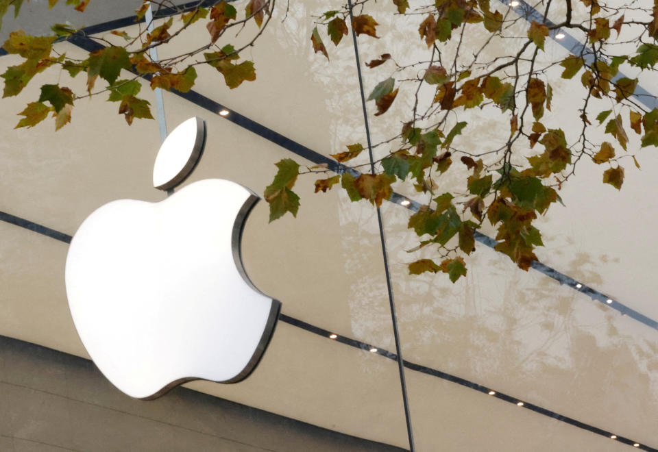 FILE PHOTO: The Apple Inc logo is seen at the entrance to the Apple store in Brussels, Belgium November 28, 2022. REUTERS/Yves Herman/File Photo