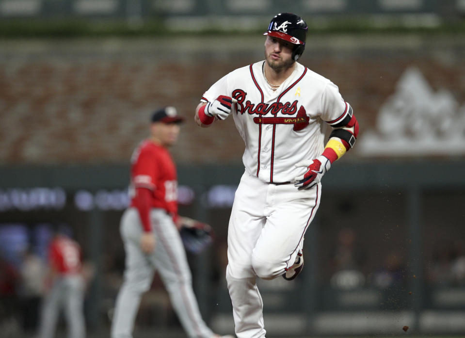 Atlanta Braves Josh Donaldson runs the bases after a home run against the Washington Nationals during the fourth inning of a baseball game Saturday, Sept. 7, 2019, in Atlanta. (AP Photo/Tami Chappell)