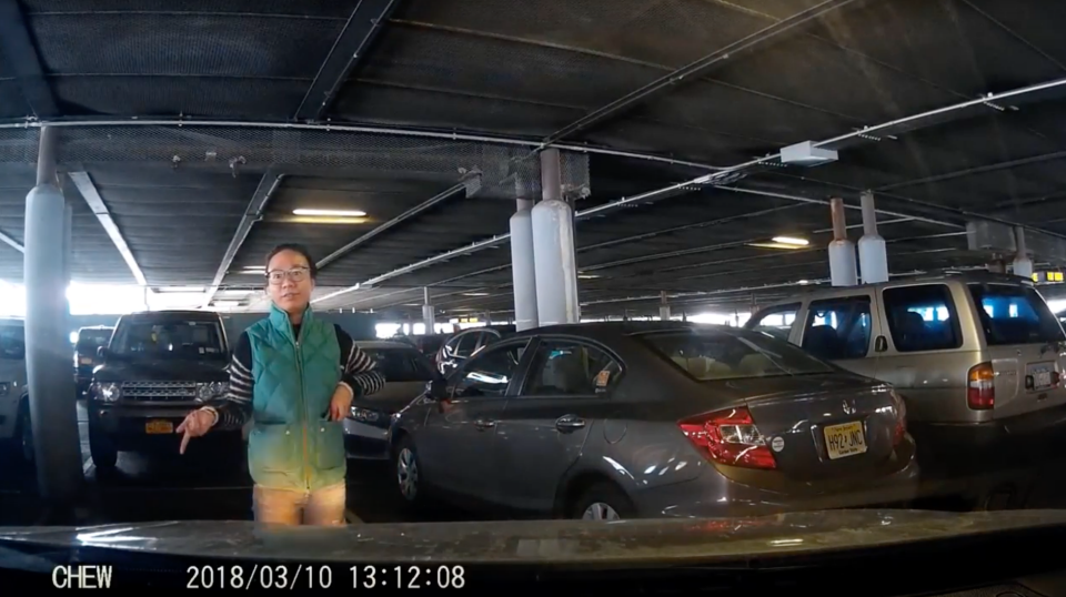 Earlier this year, this woman made headlines around the world after she was filmed “camping” in a parking space. Image: YouTube/Nicholas Chew