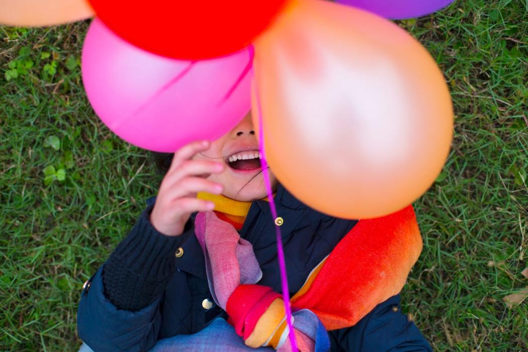 5 year old girl with balloons