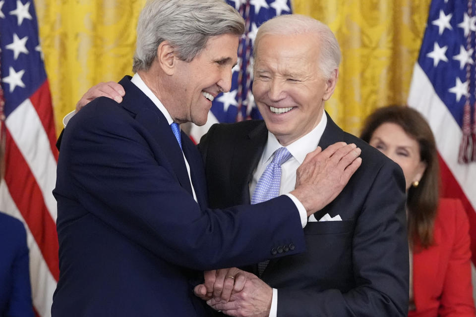 President Joe Biden awards the nation's highest civilian honor, the Presidential Medal of Freedom, to former Secretary of State John Kerry during a ceremony in the East Room of the White House, Friday, May 3, 2024, in Washington. (AP Photo/Alex Brandon)