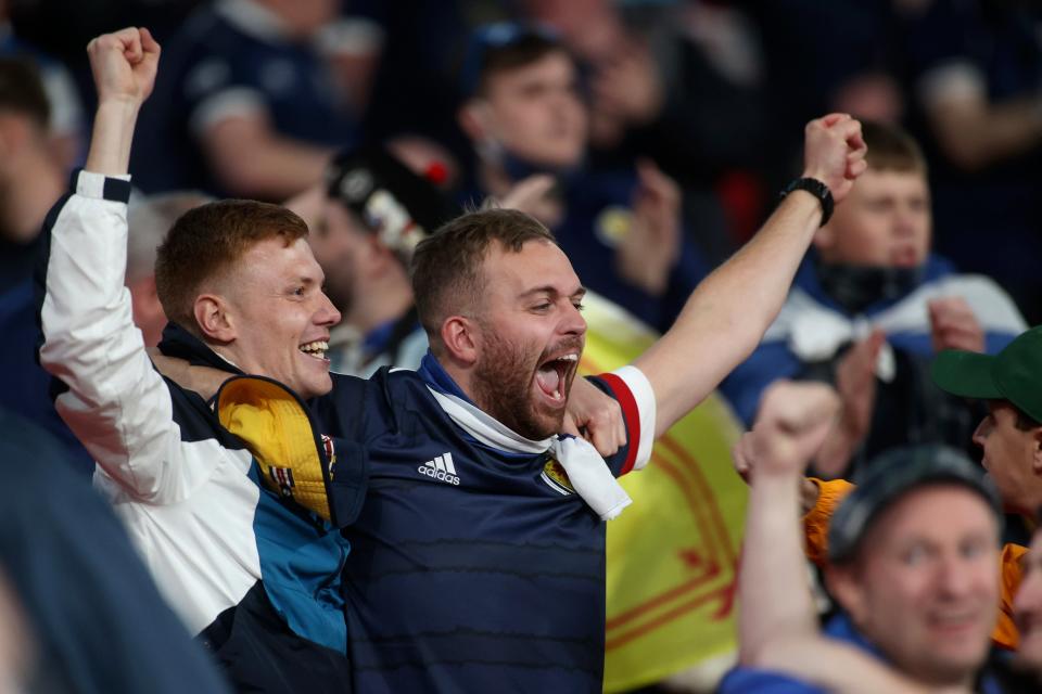 Scotland supporters celebrate at the end (AP)