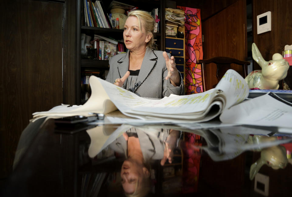 This photo taken Jan. 26, 2014 shows Catherine Fisher of Australia speaking during an interview at her home in Tokyo. An Associated Press investigation into the military’s handling of sexual assaults in Japan has found a pattern of random and inconsistent judgments in which most offenders are not incarcerated. Instead, commanders have ordered “nonjudicial punishments” that ranged from docked pay to a letter of reprimand. (AP Photo/Shizuo Kambayashi)