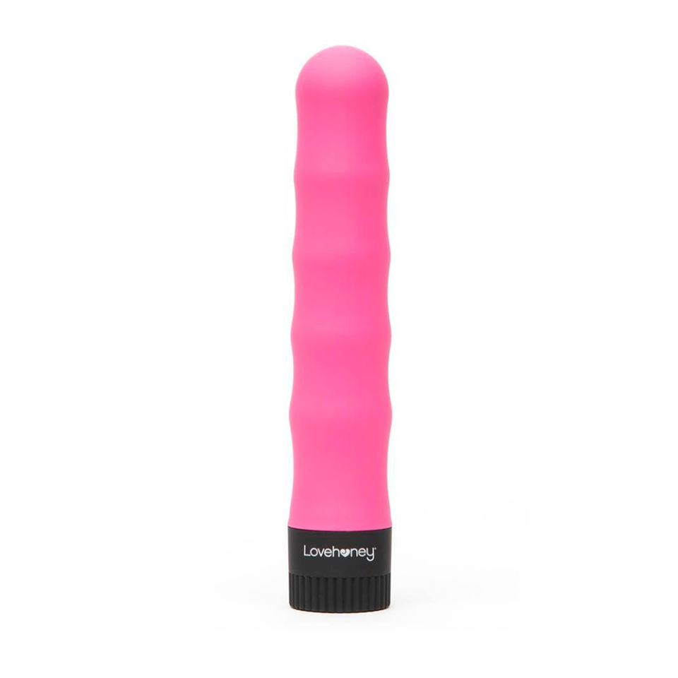 The name really does say it all. Lovehoney’s <a href="https://www.glamour.com/gallery/best-vibrators-for-beginners?mbid=synd_yahoo_rss" rel="nofollow noopener" target="_blank" data-ylk="slk:beginner-friendly" class="link ">beginner-friendly</a> Silencer is great for both internal and external stimulation, which is only intensified by the smooth and wavy shaft. While it’s engineered to be whisper-quiet, you can also bring it with you in the bath for good measure, and rev it up with its seven different vibration speeds. “It’s the perfect hitman when you need to murder your vagina but don’t want the whole house to hear it go down!” says <a href="https://www.courtneykocak.com/" rel="nofollow noopener" target="_blank" data-ylk="slk:Courtney Kocak" class="link ">Courtney Kocak</a>, comedian and co-host of the podcast <em>Private Parts Unknown</em>. $25, Lovehoney. <a href="https://www.lovehoney.com/sex-toys/vibrators/classic-vibrators/p/lovehoney-silencer-whisper-quiet-classic-vibrator-7-inch/a16603g19734.html" rel="nofollow noopener" target="_blank" data-ylk="slk:Get it now!" class="link ">Get it now!</a>