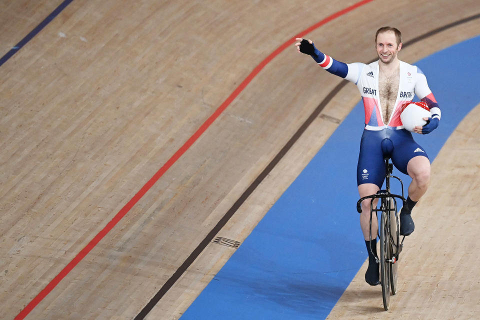 <p>Britain's Jason Kenny waves after winning gold in the Men's Track Cycling Keirin Final during the Tokyo 2020 Olympic Games.</p>