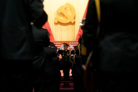 Military band members prepare inside the Great Hall of the People before the opening of the 19th National Congress of the Communist Party of China at the Great Hall of the People in Beijing, China October 18, 2017. REUTERS/Aly Song