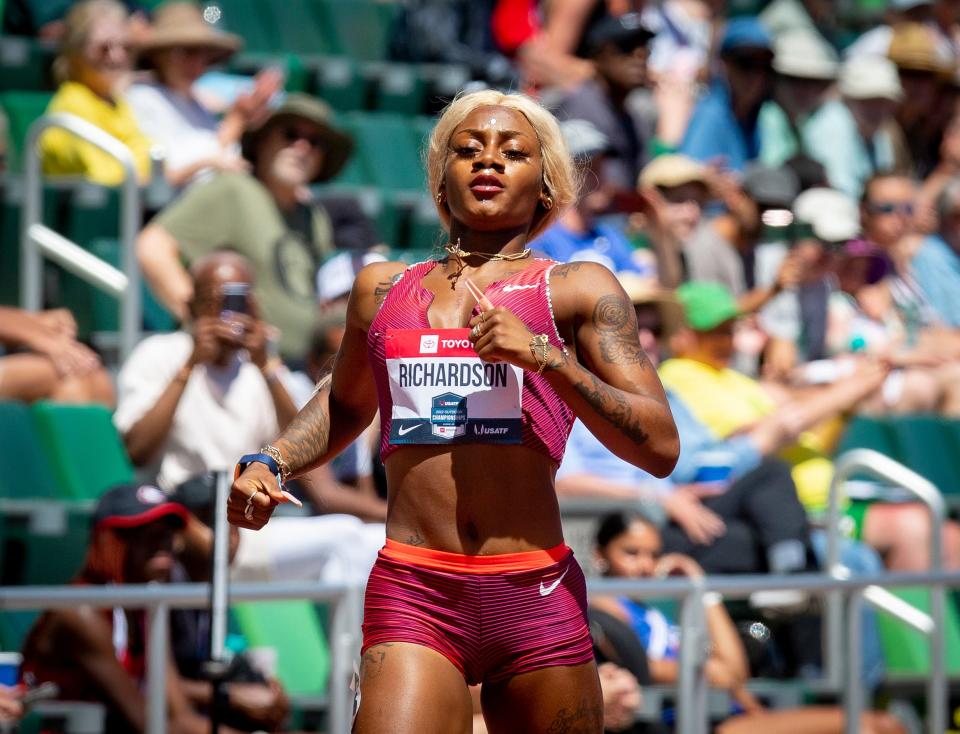 Sha'Carri Richardson crosses the finish line to advance to the semifinals in the first round of the women's 200 meters at the USA Track and Field Championships Saturday.