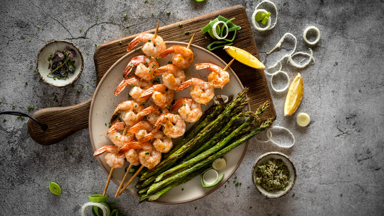 shrimp on skewers on plate