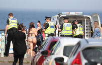 Police at Portobello Beach in Edinburgh where they broke up large crowds who flocked to the beach to make the most of the good weather.