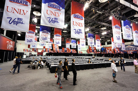 Final preparations are made to the media workspace at the University of Las Vegas for the last 2016 U.S. presidential debate in Las Vegas October 17, 2016. REUTERS/Rick Wilking