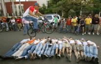 Paulo Victor Aguilera (top) of Bolivia, Latin American champion of BMX bicycle motocross, or "Bicicros", performs a stunt in Santa Cruz, some 900 km (559 miles) east of La Paz, August 28, 2007. REUTERS/Carlos Hugo Vaca