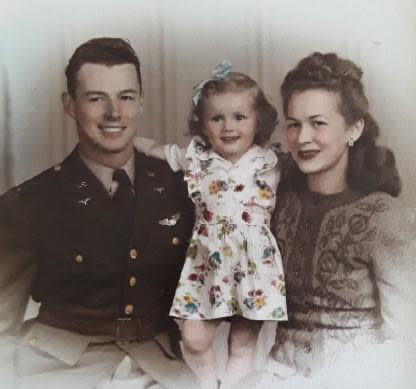 U.S. Army Air Forces 2nd Lt. Eugene P. Shauvin with his family in an undated photo. / Credit: Defense POW/MIA Accounting Agency