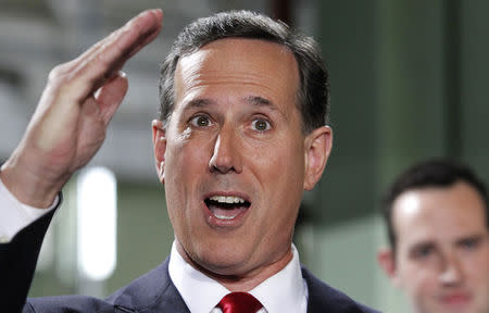 Republican presidential candidate and former U.S. Senator Rick Santorum salutes as he formally declares his candidacy for the 2016 Republican presidential nomination during an event in Cabot, Pennsylvania, May 27, 2015. REUTERS/Aaron Josefczyk