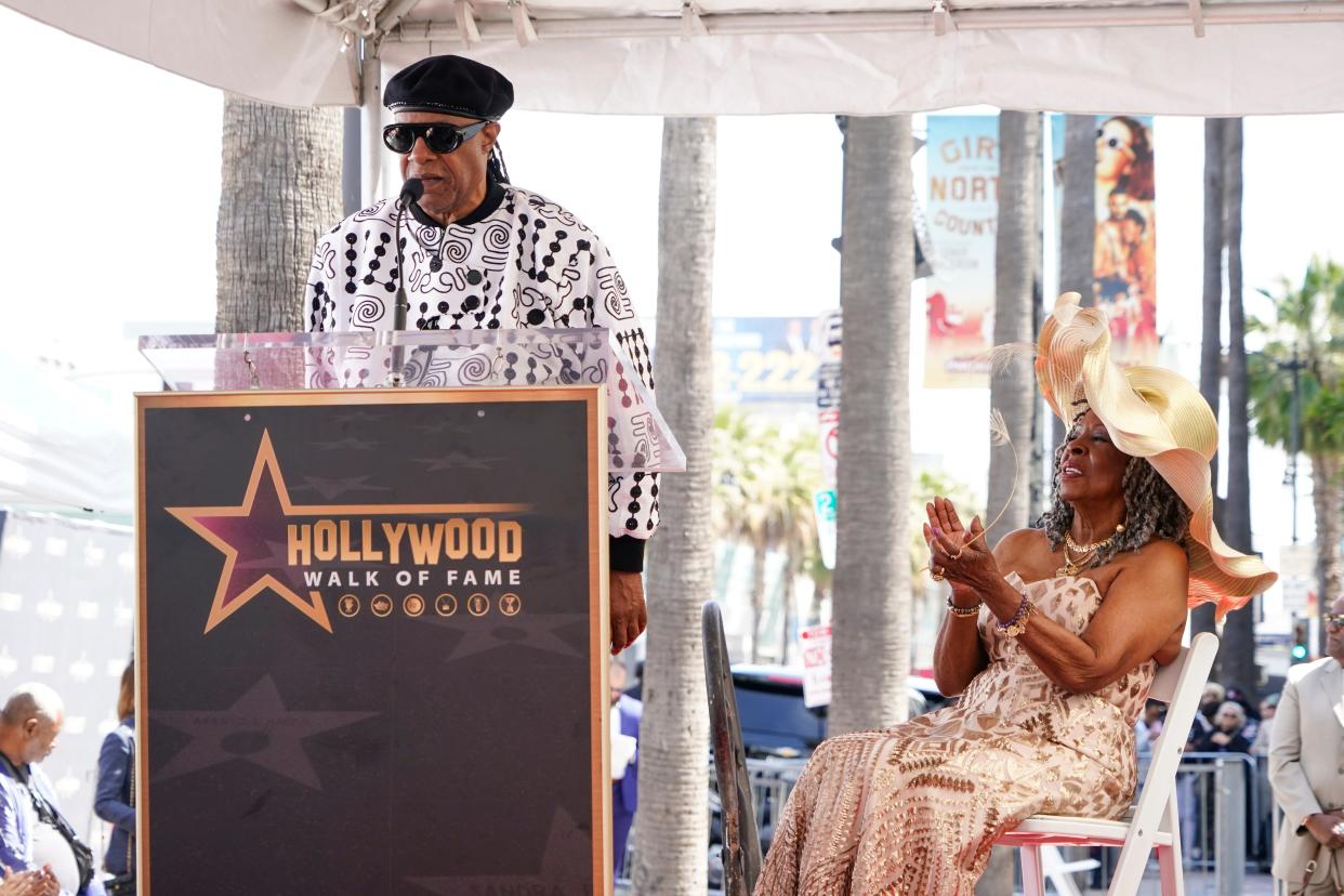 Stevie Wonder speaks during a ceremony honoring Martha Reeves (R) with the 2,776th star on the Hollywood Walk of Fame on March 27, 2024 in Los Angeles.