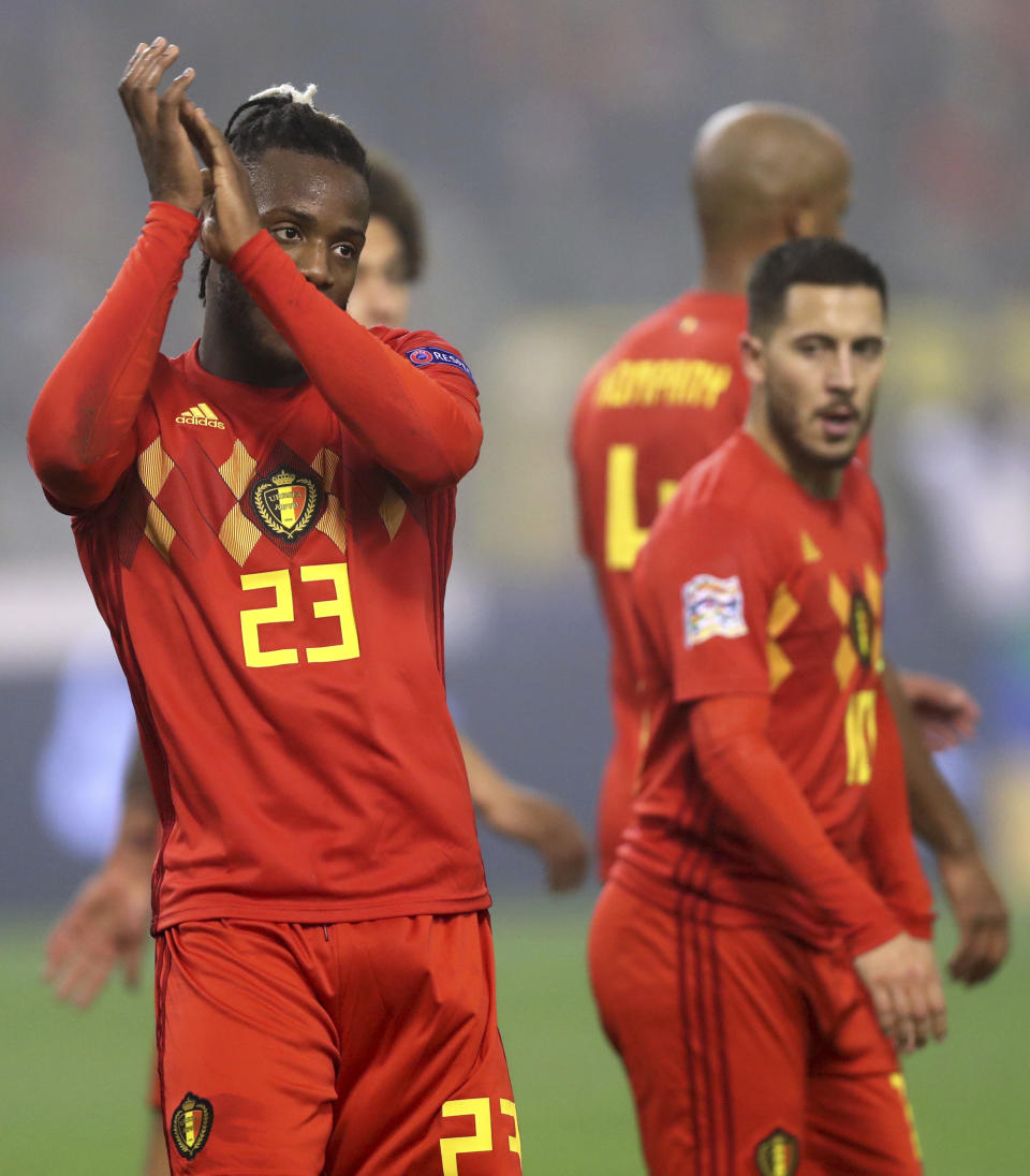 Belgium's Michy Batshuayi, left, jubilates after scoring his sides first goal during the UEFA Nations League soccer match between Belgium and Iceland at the King Baudouin stadium in Brussels, Thursday, Nov. 15, 2018. (AP Photo/Francisco Seco)