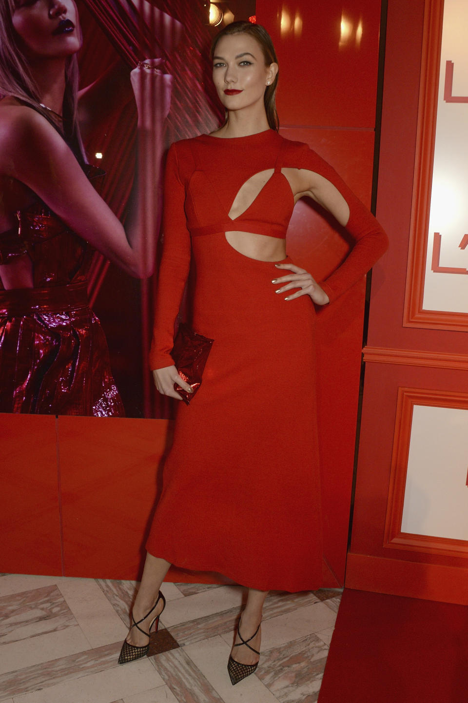 Wearing a Rosie Assoulin dress at&nbsp;the Red Obsession party to celebrate L'Oreal Paris' partnership with Paris Fashion Week on March 8, 2016, in Paris.