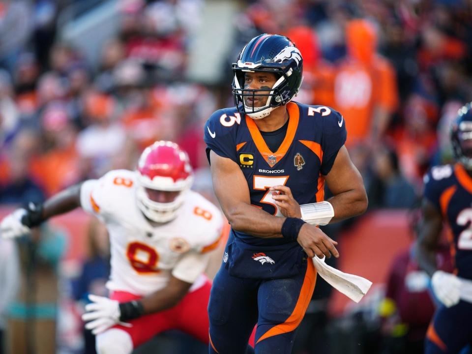 Russell Wilson makes a throw against the Kansas City Chiefs.