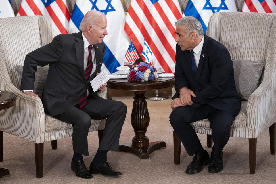 President Joe Biden and Israeli Prime Minister Yair Lapid address the media following their meeting in Jerusalem Thursday, July 14, 2022. (AP Photo/Evan Vucci)