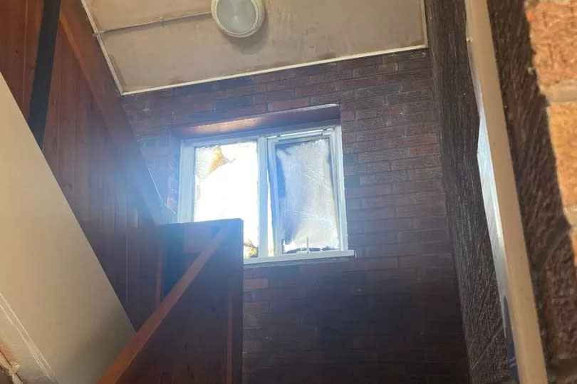 Inside the stairwell where it is believed the fire was started -Credit:Manchester Evening News