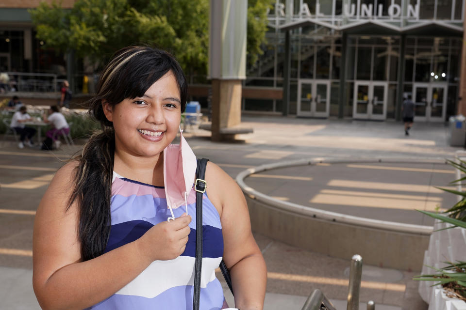 Arizona State University political science major Betzabel Ayala poses for a photo on campus Tuesday, Sept. 8, 2020, in Tempe, Ariz. Because of the coronavirus, Ayala is one of hundreds of thousands of off-campus U.S. college students who are being counted for the 2020 census at their parents' homes or other locations when they were supposed to be counted where they go to school. (AP Photo/Ross D. Franklin)