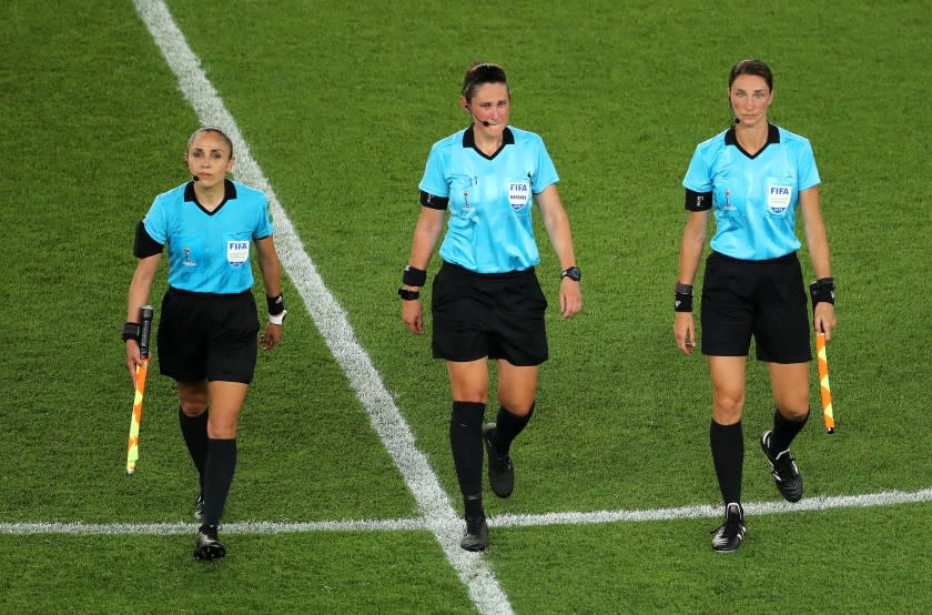 Kate Jacewicz, Kathryn Nesbitt, Felisha Mariscal leave the pitch after the 2019 FIFA Women's World Cup match