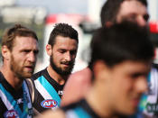 John Butcher of the Power comes from the field at half-time during the round nine AFL match between Port Adelaide Power and the Geelong Cats at AAMI Stadium on May 25, 2013 in Adelaide, Australia.