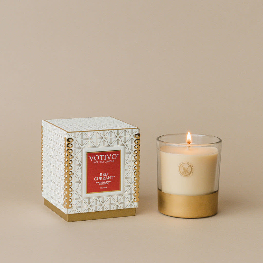 <p><a href="https://votivo.com/collections/red-currant/products/holiday-10oz-candle-red-currant" rel="nofollow noopener" target="_blank" data-ylk="slk:Shop Now;elm:context_link;itc:0;sec:content-canvas" class="link rapid-noclick-resp">Shop Now</a></p><p>Red Currant Candle </p><p>votivo.com</p><p>$32.30</p>