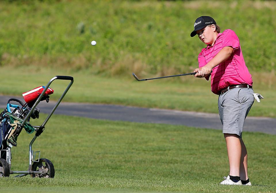 Hunter Christian hits a shot during the first round of the Times-Gazette Junior golf championships at Brookside Gold Course on Wednesday, July 20, 2022. TOM E. PUSKAR/ASHLAND TIMES-GAZETTE