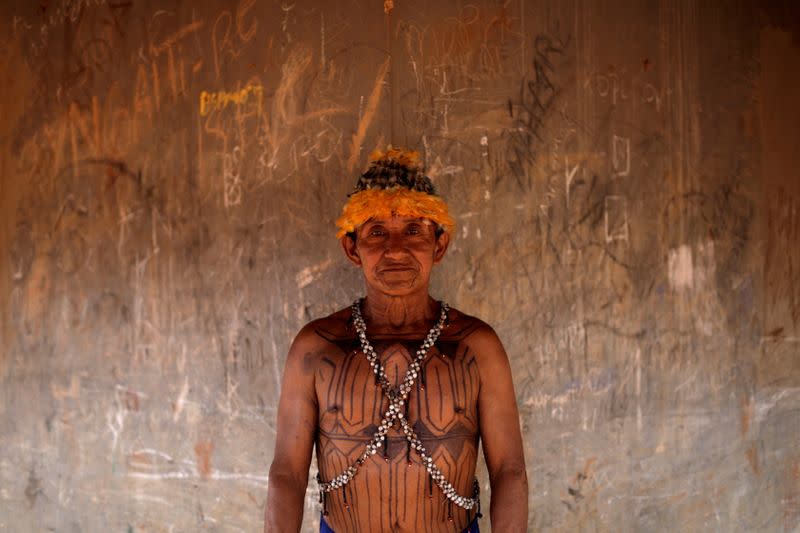 Geraldo, from Munduruku tribe poses for a picture during a four-day pow wow in Piaracu village, in Xingu Indigenous Park, near Sao Jose do Xingu